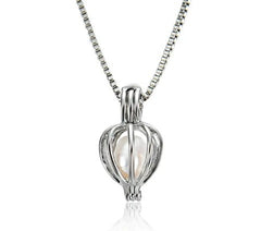 Natural Pearl Cage Necklace – Oyster-Inspired Pendant Collection
