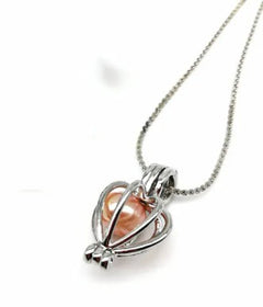 Natural Pearl Cage Necklace – Oyster-Inspired Pendant Collection