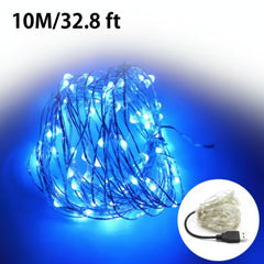Blue USB LED fairy lights coiled and glowing in bright blue.